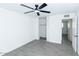 Modern bedroom with closet and contemporary ceiling fan at 3128 N 40Th Ave, Phoenix, AZ 85019