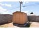 Backyard shed featuring single door and privacy wall at 3128 N 40Th Ave, Phoenix, AZ 85019