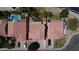 Overhead view of a home with a red tile roof, a pool, and manicured landscaping at 332 N Cobblestone St, Gilbert, AZ 85234