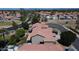 Aerial view of the property showcasing the tile roof and surrounding community at 332 N Cobblestone St, Gilbert, AZ 85234