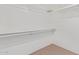 Walk-in closet with shelving for ample storage at 332 N Cobblestone St, Gilbert, AZ 85234