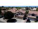 Charming two-story home with a red tile roof and a spacious driveway in a well-maintained neighborhood at 332 N Cobblestone St, Gilbert, AZ 85234