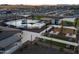 Aerial view of a community pool, playground and barbeque area surrounded by single Gathering homes at 3582 E Audrey Dr, San Tan Valley, AZ 85143