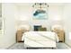 Bright bedroom featuring stylish decor, ample natural light, and neutral tones at 36570 W Maddaloni Ave, Maricopa, AZ 85138