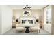 Cozy main bedroom with a large bed, modern lighting, and stylish decor at 36570 W Maddaloni Ave, Maricopa, AZ 85138