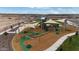 Fun playground with multiple play structures, offering a safe and engaging environment for children to play and explore at 46392 W Lander Ln, Maricopa, AZ 85139