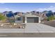 Charming single-story home with desert landscaping and mountain views at 46395 W Lander Ln, Maricopa, AZ 85139