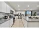 Spacious kitchen features stainless steel appliances, granite countertops and an open concept layout at 46395 W Lander Ln, Maricopa, AZ 85139