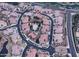 Aerial view of the residential area showcasing the community pool and well-maintained streets at 4777 S Fulton Ranch Blvd # 1032, Chandler, AZ 85248
