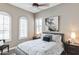 Comfortable bedroom featuring shuttered windows, contemporary furniture, and neutral tones for a relaxing atmosphere at 4777 S Fulton Ranch Blvd # 1032, Chandler, AZ 85248