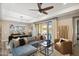 Comfortable living room with a large sectional sofa, coffee table, and sliding glass doors to the backyard at 4777 S Fulton Ranch Blvd # 1032, Chandler, AZ 85248