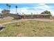 Ranch style house with a brick facade and a walkway through the front yard at 530 E Draper St, Mesa, AZ 85203