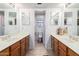 Bathroom featuring double sinks and separated toilet at 5407 W North Ln, Glendale, AZ 85302