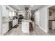 Modern kitchen boasts stainless steel appliances, a center island with seating, and plenty of cabinet space at 5407 W North Ln, Glendale, AZ 85302