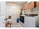 Well-equipped laundry room with plenty of storage space at 5407 W North Ln, Glendale, AZ 85302
