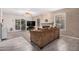 Cozy living room with a fireplace, neutral colors, and tile/carpet flooring at 5407 W North Ln, Glendale, AZ 85302