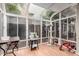 Bright sunroom with multiple windows and views of the yard at 5407 W North Ln, Glendale, AZ 85302