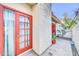 Patio with lush desert landscape and glass door entry at 633 W Southern Ave # 1131, Tempe, AZ 85282