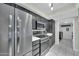 Modern kitchen featuring stainless steel appliances, sleek countertops, and ample cabinet space, perfect for cooking at 633 W Southern Ave # 1131, Tempe, AZ 85282