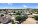 Residential home featuring desert landscape, mature trees, and a private fenced in backyard at 645 S 54Th St, Mesa, AZ 85206