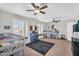 Spacious bedroom with a bunk bed, window seating, and carpeted floors at 645 S 54Th St, Mesa, AZ 85206