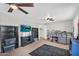 Spacious bedroom with a bunk bed, TV, and carpeted floors at 645 S 54Th St, Mesa, AZ 85206