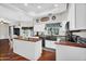 Bright kitchen with an island, white cabinetry, modern countertops and fixtures at 645 S 54Th St, Mesa, AZ 85206