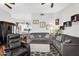 Spacious living room featuring hardwood floors and comfortable seating at 645 S 54Th St, Mesa, AZ 85206