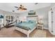 Comfortable bedroom with lots of natural light, ceiling fan and stylish furnishings at 645 S 54Th St, Mesa, AZ 85206