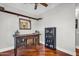 Office area featuring custom bar, hardwood floors, and bar cabinet at 645 S 54Th St, Mesa, AZ 85206