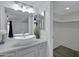 Bright bathroom features a modern vanity with vessel sink and walk-in closet at 850 S River Dr # 1068, Tempe, AZ 85281