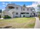 Condominium with manicured lawn and a well-maintained, two-story facade at 850 S River Dr # 1068, Tempe, AZ 85281