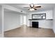 Bright living room featuring a fireplace, light wood floors, and neutral paint at 850 S River Dr # 1068, Tempe, AZ 85281