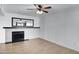 Neutral living room featuring fireplace and light wood floors at 850 S River Dr # 1068, Tempe, AZ 85281