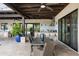 Relaxing covered patio with ceiling fans, and outdoor dining area perfect for entertaining at 8821 E Havasupai Dr, Scottsdale, AZ 85255