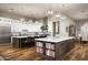 Spacious open kitchen with dual islands, stainless appliances, and ample counter space at 8821 E Havasupai Dr, Scottsdale, AZ 85255