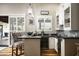 Breakfast bar area leading to the outdoor patio, complete with wine fridge and storage at 8821 E Havasupai Dr, Scottsdale, AZ 85255