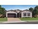 Charming home with a well-manicured lawn and a neutral color scheme at 886 W Peralta Pass, Apache Junction, AZ 85120