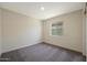 Well-lit bedroom with soft carpet and natural light, creating a welcoming ambiance at 1102 W West Virginia Ave, Florence, AZ 85132