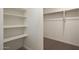 Ample storage with shelving and rods, making organization easy in the walk-in closet at 1102 W West Virginia Ave, Florence, AZ 85132