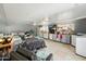Spacious living room with lots of light and access to laundry room at 12501 E Cloud Rd, Chandler, AZ 85249