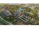 Community aerial view shows pool, athletic courts and immaculate landscaping at 13553 N 141St Ln, Surprise, AZ 85379
