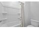 This bathroom features a shower/tub combination and a toilet at 13553 N 141St Ln, Surprise, AZ 85379