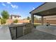 Built-in outdoor kitchen boasts grill, sink, and ample counter space for cooking, perfect for outdoor dining at 13553 N 141St Ln, Surprise, AZ 85379