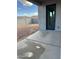 View of the back patio area, backyard, and block wall at 14861 S Capistrano Rd, Arizona City, AZ 85123