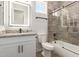 Bathroom featuring granite countertops, tiled shower and floors, and lighted mirror at 14861 S Capistrano Rd, Arizona City, AZ 85123