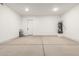 Spacious garage featuring an installed water heater at 14861 S Capistrano Rd, Arizona City, AZ 85123