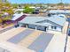 Aerial view of a cozy home with desert landscaping in the front yard and a carport for covered parking at 1510 W 7Th Dr, Mesa, AZ 85202
