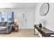 Bright living room featuring wood floors, comfortable seating, and modern accents at 1510 W 7Th Dr, Mesa, AZ 85202