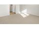 Bedroom with carpet, base molding, and natural light at 16071 W Remuda Dr, Surprise, AZ 85387